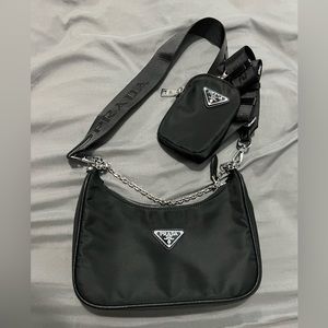 - New black nylon cross body bag with pouch,cross body strap, chain  NOT REAL